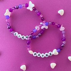 ♡ Honor Liam Payne's memory with these beautiful purple bracelets, crafted in his favorite color. Each bracelet serves as a heartfelt tribute, celebrating his life and legacy. Wear it as a symbol of love and remembrance for a truly inspiring artist. ♡ Proceeds will be donated to Mental Health Organizations <3 ♡ Patterns in the beads may vary!  ♡ Made with elastic string! Usually around 7 inches, but can stretch to fit! If you'd like a different size, please see the personalization section!  ♡ Pl Liam Payne Bracelet, One Direction Bracelet, Purple Bracelets, Apple Watch Bands Fashion, Wearing Purple, Memorial Bracelet, Purple Bracelet, Handmade Jewelry Tutorials, Beaded Bracelets Diy