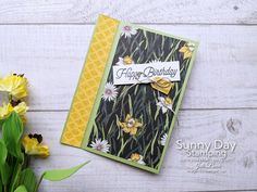 a close up of a greeting card with flowers