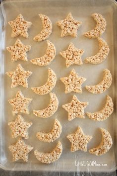 an uncooked cookie sheet with moon and stars on it