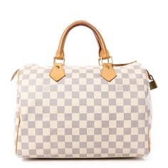 This is an authentic LOUIS VUITTON Damier Azur Speedy 30. This stylish tote is crafted of Louis Vuitton Damier coated canvas in blue and white. The handbag features natural vachetta cowhide leather trim and rolled top handles with polished brass hardware. The top zipper opens the bag to an interior of ivory fabric with a hanging pocket. Designer White Satchel With Leather Handles, White Monogram Canvas Satchel Bag, White Monogram Canvas Bag For Everyday, White Monogram Canvas Bags For Everyday Use, White Monogram Canvas Satchel Shoulder Bag, White Rectangular Monogram Canvas Bag, White Satchel With Detachable Handle In Coated Canvas, White Coated Canvas Satchel With Detachable Handle, White Luxury Everyday Bag With Handles