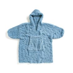 a blue sweater that is on top of a white surface with the hood pulled up