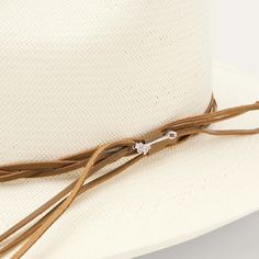 Handmade in the U.S.A. from high-quality shantung, the Gus 10X Straw Cowboy Hat has a 3 3/4” brim and a sloped 4” x 5 ½” Gus crown. Its classic western silhouette is enhanced by a braided leather cord hat band, while a genuine leather sweatband ensures a secure fit and all-day comfort. 4” x 5 ½” Gus Crown 3 ¾” Brim R Oval Braided Leather Cord Hat Band Genuine Leather Sweatband 10X Quality Shantung Straw Handmade in the U.S.A. Elegant Wide Brim Top Hat For Outdoor, Elegant Wide Brim Top Hat For Ranch, Elegant Brimmed Hat Bands For Ranch, Classic Panama Hat With Flat Crown For Country Events, Elegant Boater Hat With Short Brim For Rodeo, Elegant Fedora For Rodeo And Kentucky Derby, Western Style Formal Boater Hat With Curved Brim, Formal Western Boater Hat With Curved Brim, Elegant Short Brim Boater Hat For Rodeo