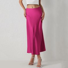 This Seasonal Fave Satin Long Midi Skirt is the new power player in our wardrobe! Features a high waistline, a figure-skimming silhouette with side pleated details for a chic look, and a flowy midi hem Comes in eight colors Made from quality Polyester Available in sizes S-L Model is wearing size S Fitted Midi Skirt Solid Color, Elegant Pink Solid Skirt, Elegant Pink Solid Color Skirt, Chic Solid Color Maxi Skirt With Lining, Chic Lined Maxi Skirt, Chic Flowy Skirt In Solid Color, Chic Pleated Skirt In Solid Color, Pink Long Skirt Solid Color, Non-stretch Midi Length Skirt