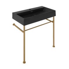 a black sink with gold legs on a white background