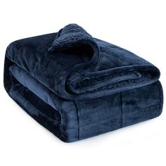 a blue blanket folded on top of each other