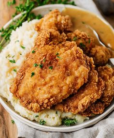 fried chicken and mashed potatoes on a plate