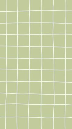 a green and white checkered wallpaper pattern with lines in the center, as well as small squares