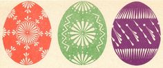 three colored easter eggs with intricate designs on the sides, each painted in different colors