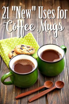 two green mugs filled with coffee and cookies