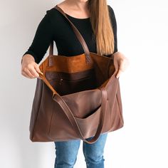 OVERSIZED LEATHER TOTE BAG - LEATHER SHOPPING BAG - LARGE TOTE This Leather Handbag is made of full grain, high quality natural leather. It's is very roomy - perfect for school, work and travel - great option as your everyday bag. Large interior provides a lot of space for all the daily essentials (books, cosmetic bag, accessories, laptop and other electronic devides, clothes and more). Inside the shopper bag there is an additional pocket with zipper for other small items. There is also large po Cognac Large Capacity Weekender Bag, Cognac Rectangular Weekender Bag With Large Capacity, Cognac Tote Travel Bag For Everyday Use, Everyday Cognac Tote Travel Bag, Brown Hobo Bag With Pockets For Shopping, Brown Weekender Bag With Adjustable Strap, Brown Shopping Bag With Pockets, Brown Weekender Bag With Adjustable Strap For Shopping, Brown Shoulder Travel Bag For Shopping