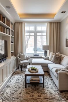 a living room filled with furniture and a flat screen tv