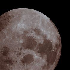 the full moon is seen in this image