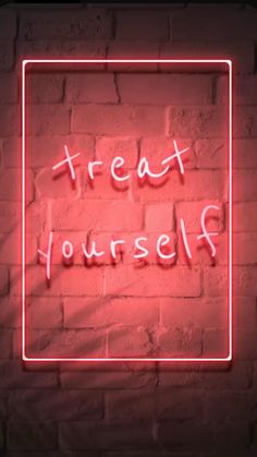 a neon sign that says treat yourself on a brick wall with the words treat yourself