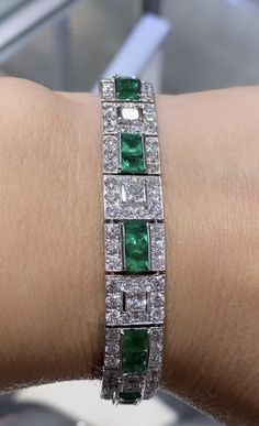 Platinum diamond and emerald bracelet with princess and round brilliant cut diamonds weighing 9.36 carats total of F color, VS2 clarity. Bracelet also features emerald cut emeralds of excellent cut, hue, and even color distribution. Classic Luxury Diamond Bracelet With Emerald, Luxury Elegant Rectangular Gemstones, Diamond Aesthetic, Expensive Jewelry Luxury, Bracelet Diamond, Emerald Bracelet, Pretty Jewelry, Expensive Jewelry, Deco Jewelry