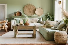 a living room filled with lots of furniture next to a window covered in wicker baskets