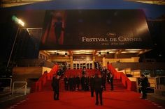 people are walking up the red carpeted stairs at festival de cannes in paris