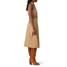 Beige cotton (100% Cotton). Hourglass. Sleeveless. Shirt collar neckline. Attached belt. Exposed front button down placket. Side pockets. 49" from shoulder to hemline. Imported. Sleeveless Cotton Shirt Dress For Daywear, Sleeveless Belted Shirt Dress For Summer, Sleeveless Cotton Shirt Dress For Work, Sleeveless Cotton Shirt Dress With Buttons, Classic Sleeveless Shirt Dress For Work, Sleeveless Shirt Dress With Pockets For Spring, Classic Sleeveless Shirt Dress For Daywear, Chic Sleeveless Cotton Shirt Dress, Sleeveless Shirt Dress With Button Closure For Work