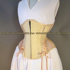 New UNDERBUST from "MystiC City Corsets" design: MCC-44L color/fabric: photo ( beige/buttercream cotton/mesh/satin)  ORIGINAL design/photo: "MystiC City Corsets" - lining: 100% cotton twill steel boning  - 6 x 12mm wide "white" flat steel flexible bones  - 20 x 6mm wide spiral steel bones ( size 18" has 10 spiral bones) - front zipper - floating modesty panel: 5" wide ( boned) - waist tape - high quality 1/4" grommets - matching lacing cord Corset MCC-44L is recommended for waist training, perfect for 4-6" waist reduction waist can stretch a bit and sizes runs big Other sizes/colors available on customer request (4-8 weeks of waiting) please contact me Photo Beige, Steel Boned Corsets, Lace Tights, Cute Nike Shoes, Cute Nikes, Waist Training, White Flats, Cotton Twill, Front Zipper