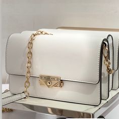 %100 Authentic Michael Kors Cece Clutch Bag New With Tag Trendy White Michael Kors Bag, Designer White Bags With Metal Hardware, Chic White Michael Kors Bag, Formal White Michael Kors Bag, Chic White Michael Kors Shoulder Bag, Elegant White Michael Kors Shoulder Bag, White Elegant Michael Kors Shoulder Bag, Michael Kors White Pouch Bag, Michael Kors White Shoulder Bag With Chain Strap