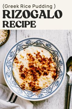 a bowl filled with rice and topped with gravy next to two spoons