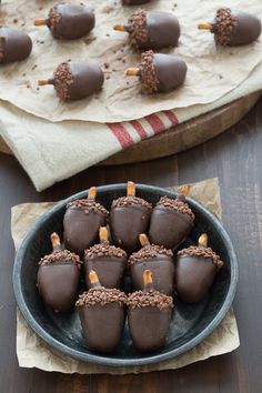 chocolate covered candies in a bowl on a table