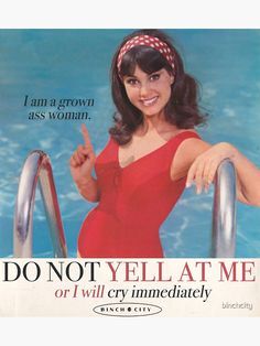 a woman in a red swimsuit pointing at the camera with an ad for women's magazine