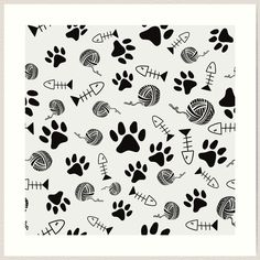 black and white dog paw prints with fish, balls of yarn and crochet hooks