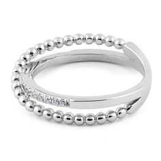 Top of ring height: 2mm

Band width: 4.6mm

Shank width: 2mm



Stone material: clear cubic zirconia

Stone shape: round

Total number of CZ stones: 14

Stone setting: surface prong setting



Metal: 925 sterling silver

Plating: rhodium plated

Finish: high polish Silver Cubic Zirconia Stackable Rings With Open Band, Modern Silver Stackable Rings With Cubic Zirconia, Modern Silver Cubic Zirconia Stackable Rings, Modern Silver Jewelry With Half Eternity Detail, Modern Silver Half Eternity Jewelry, Silver Cubic Zirconia Stackable Round Band Rings, Silver Cubic Zirconia Stackable Rings, Modern Rings With Sparkling Cubic Zirconia Stones, Modern Rings With Sparkling Cubic Zirconia