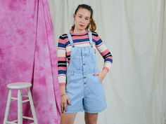 "AUNT GERTRUDE PRESENTS - vintage 90's blue denim overalls - brand: Joy - 5 pockets - materials: 100% cotton CONDITION (1-10 ❶❷❸❹❺❻❼❽❾ Great vintage condition. SIZE/MEASUREMENTS size from label: L bust: open waist: 34 inches (86 cm) hips: 45 inches (114 cm) The model is 5'9\" (174 cm), measures 35-27-38 (90-69-96 cm) and wears size M" Retro Denim Jumpsuit For Summer, Vintage Medium Wash Overalls For Summer, Spring Vintage High Waist Overalls, Retro Medium Wash Jumpsuits And Rompers For Summer, Retro Summer Jumpsuits And Rompers In Medium Wash, Retro Denim Overall Jumpsuit For Summer, Retro Medium Wash Denim Jumpsuit For Summer, Retro Shortalls With Pockets For Spring, Retro Blue Overalls For Spring