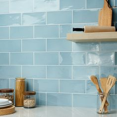 the kitchen counter is clean and ready to be used as a utensil holder