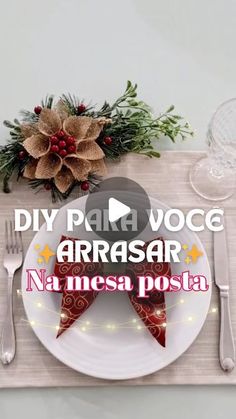 a place setting with silverware and napkins on it, decorated with poinsettia