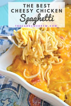 the best cheesy chicken spaghetti in a white casserole dish with a spoon