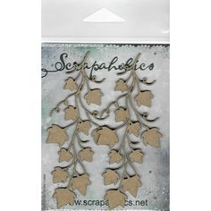 a card with some paper cutouts on it and the words scrappadlics