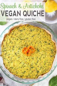 spinach and artichoke vegan quiche in a glass pie dish