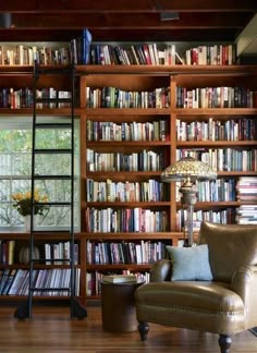 a living room filled with lots of books