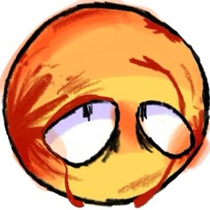 a drawing of an orange smiley face with tears on it's eyes and nose