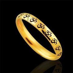 OM AUM Wedding Ring Gold Eternity Om Band Religious Wedding Black Painting Unisex Antique Finish Anniversary The OM (or AUM) sign is the main symbol of Hinduism. Most religions indicate that creation began with sound-- In the beginning was the word... For the Hindus & Buddhists, Om is the primordial sound, the first breath of creation, the vibration that ensures existence. Om sign signifies God, Creation, & the One-ness of all creation. This band is made of 14k yellow gold and is 2.7mm w Black Bangle For Wedding, Symbolic Engraved Wedding Ring, Symbolic Wedding Engraved Ring, Spiritual Engraved Wedding Ring, Symbolic Black Jewelry For Wedding, Symbolic Black Wedding Jewelry, Spiritual Adjustable Engraved Wedding Ring, Adjustable Spiritual Engraved Wedding Ring, Adjustable Spiritual Engraved Ring For Wedding