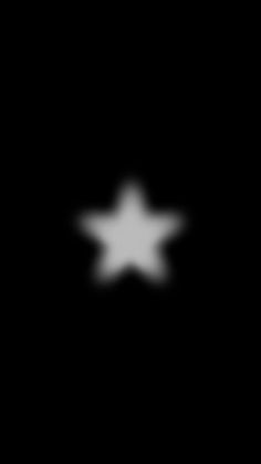 a black background with white stars in the middle and one star on the right side