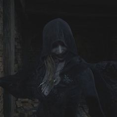 a creepy looking person in a dark room