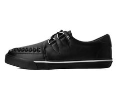 Normal is boring! Get ready to hit the stage or the streets in these vulcanized sneakers that reimagines our former creeper sneaker silhouette with bold & modern twists. Features one of our popular upper styles of black leather with classic D-rings & iconic interlace detailing along the front. The VLK collection features a more streamlined and sleeker look compared to our past creeper sneaker designs. In addition to its' updated form, the vulcanized sneakers have removable insoles with a Punk Sneakers With Studded Rubber Outsoles For Streetwear, Casual Custom Sneakers With Spikes For Streetwear, Punk Streetwear Sneakers With Studded Outsoles, Edgy High-top Sneakers With Vulcanized Sole, Edgy Sneakers With Vulcanized Sole For Streetwear, Edgy High-top Sneakers With Vulcanized Sole For Streetwear, Edgy High-top Sneakers With Rubber Sole For Streetwear, Edgy High-top Sneakers For Streetwear With Rubber Sole, Edgy Low-top Sneakers With Vulcanized Sole