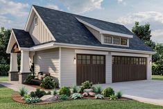 a two car garage with an attached porch and living area on the side of it