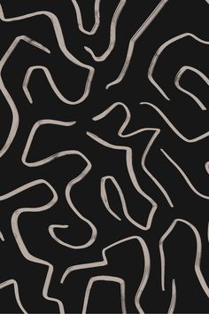 an abstract black and white background with wavy lines in the shape of letters that appear to be made out of paper