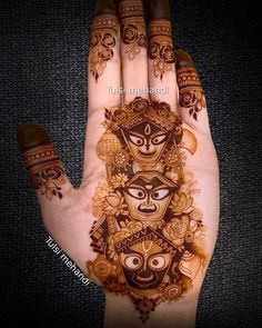 the hand is decorated with an intricate design