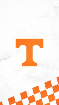 an orange and white checkered background with the letter t on it's side