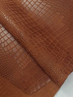 brown leather textured with crocodile skin