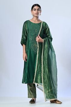 Green kurta with fabric dori hand embroidery in floral pattern, elevated with metal sequins and beads. Paired with a block printed pant and dupatta. - Aza Fashions Festive Embroidered Slub Silk Fabric, Festive Tussar Silk Traditional Wear With Mirror Work, Festive Traditional Wear With Mirror Work In Tussar Silk, Ceremonial Chanderi Salwar Kameez With Gota Work, Ceremonial Cotton Silk Festive Sets, Ceremonial Festive Cotton Silk Sets, Elegant Ceremonial Sets With Gota Work, Ceremonial Silk Traditional Wear With Gota Work, Ceremonial Cotton Silk Set With Zari Work