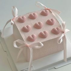 there is a cake that has hearts on it