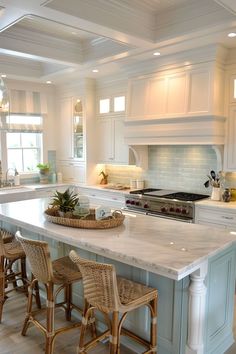 a large kitchen with an island in the middle and four stools at the end