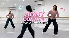 a woman in pink shirt and black pants dancing with her hands behind her back as if she's about to do something