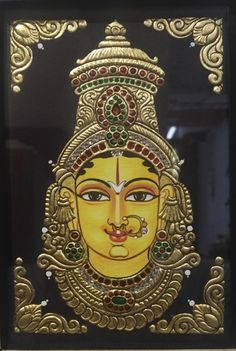 an art work with gold and green colors on black glass, depicting the face of lord rama